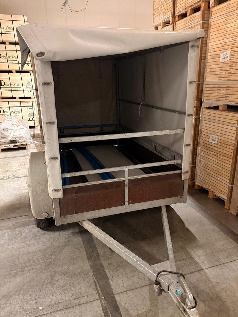 Dubbelas-aanhangwagen met huif, Ophalen, Gebruikt