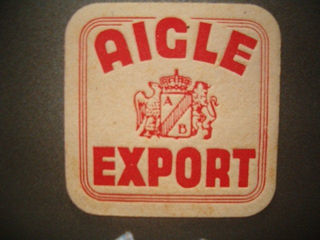 Tapis à bière Aigle-Belgica  2 : Avant-guerre : 95 x 95 mm, Collections, Enlèvement ou Envoi, Utilisé, Sous-bock