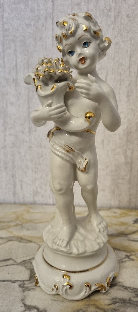 Antiek porseleinen beeldje van een naakte jongen, Antiek en Kunst, Ophalen of Verzenden