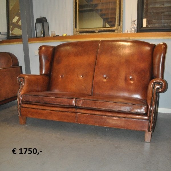 Brocante schaapsleren fauteuils, Enlèvement