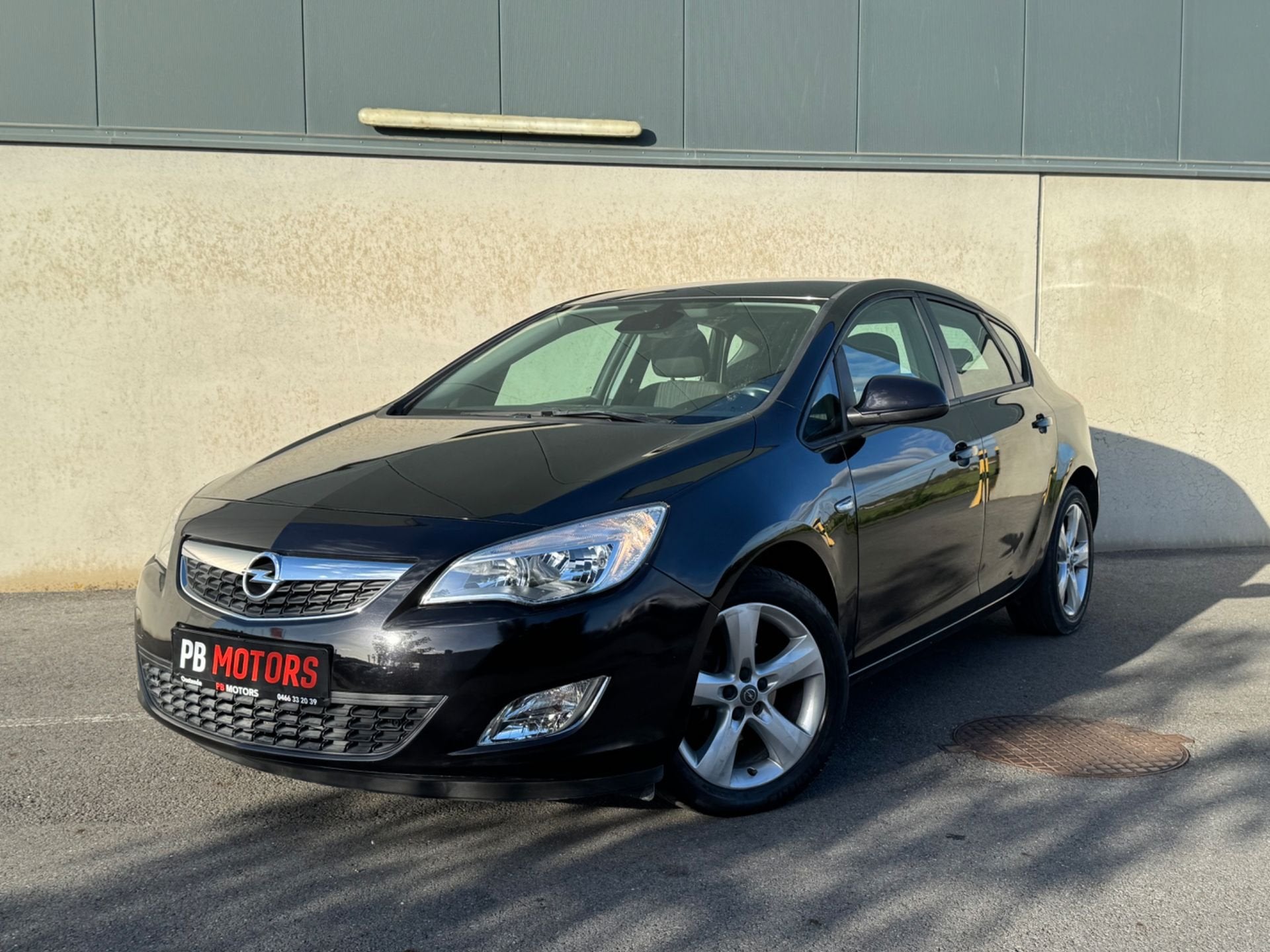 Opel Astra 41.868 km slechts - 2010 - benzine 1.4 airco, Auto's, Voorwielaandrijving, 1373 kg, Gebruikt, Zwart