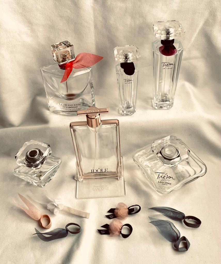 Verzameling Lancôme flesjes en strikjes, Ophalen of Verzenden, Gebruikt, Parfumfles