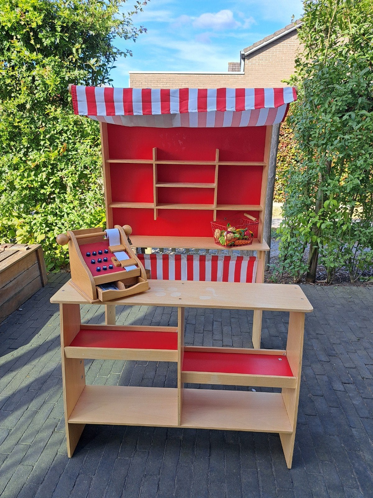 Speelwinkel met toebehoren, Ophalen