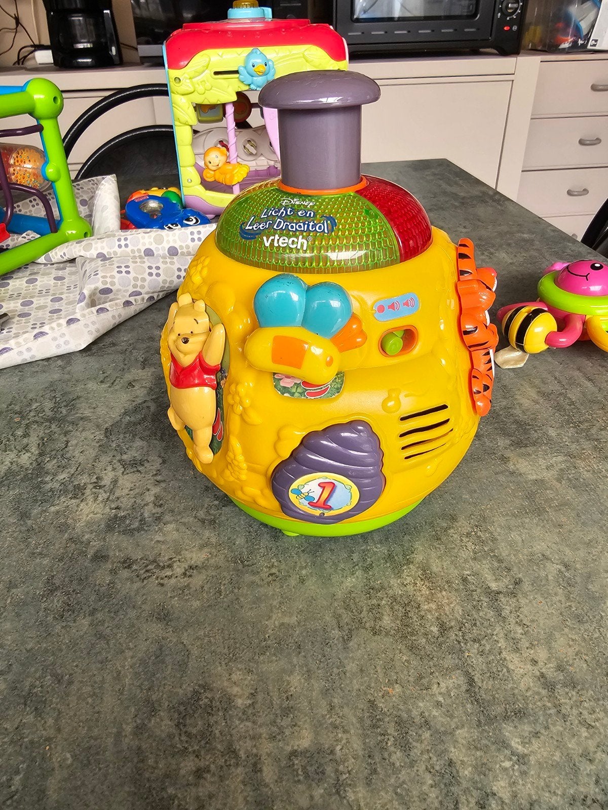 Vtech Licht en leer draaitol, Ophalen