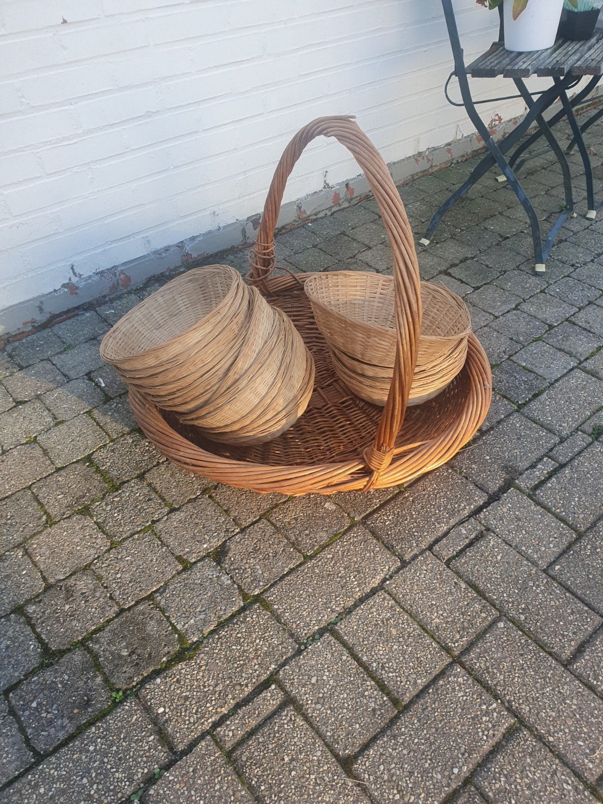 mand en korfjes, Ophalen, Mand