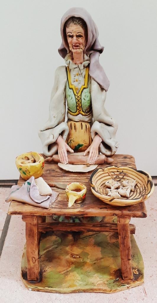 Figurine femme Ambrogio Massidda, Enlèvement