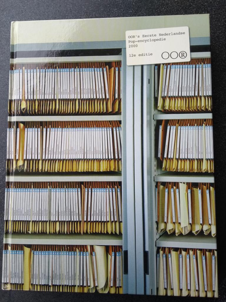 OOR's Eerste Nederlandse pop-encyclopedie 2000, 12e editie, Boeken, Ophalen of Verzenden, Zo goed als nieuw