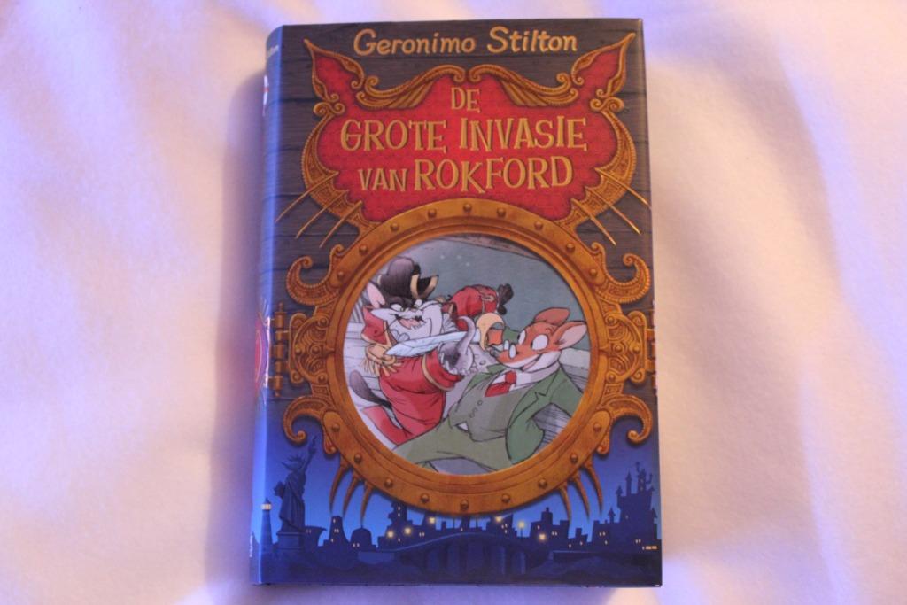 boek 'Geronimo Stilton: de grote invasie van Rokford, Ophalen of Verzenden, Zo goed als nieuw, Fictie algemeen