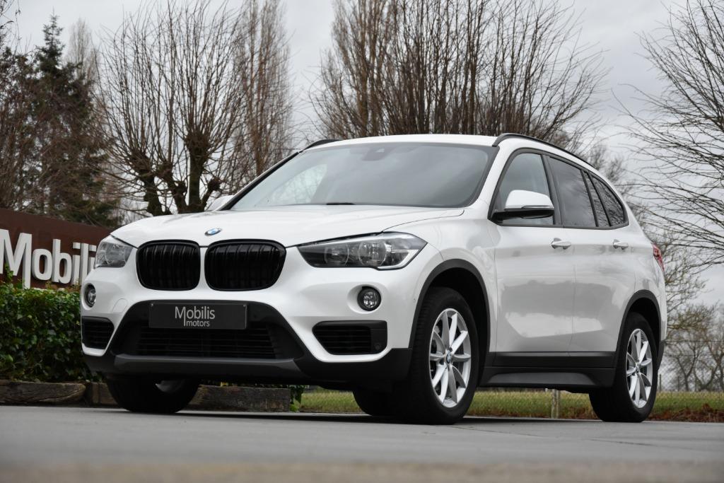 BMW X1 sDrive18i Automaat Benzine Trekhaak/NaviPro/Garantie, Auto's, BMW, Wit, Bedrijf, 5 zetels, SUV of Terreinwagen