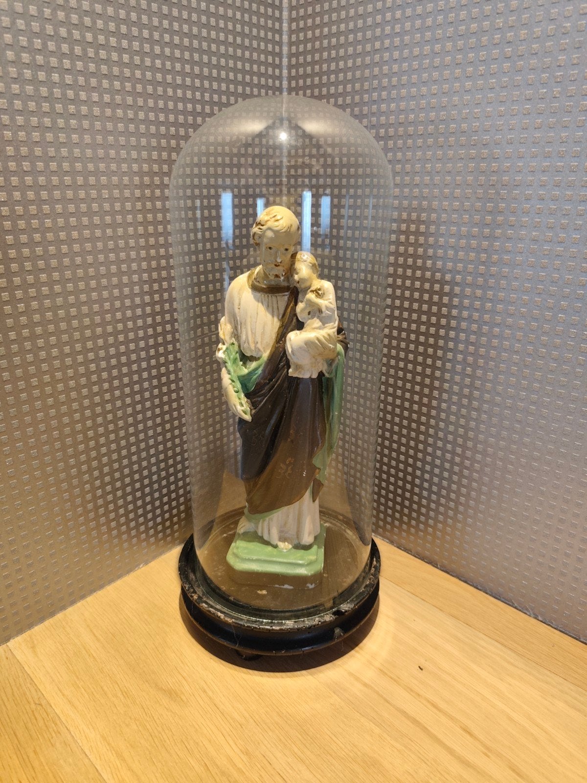 Heiligenbeeld onder stolp., Ophalen
