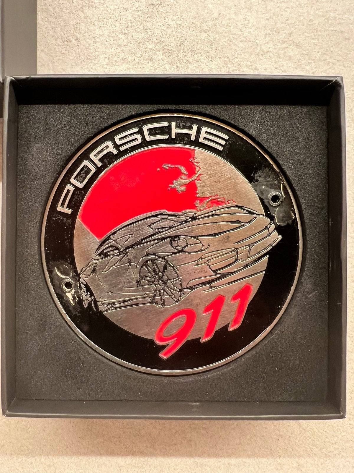 Porsche 911 logo, Ophalen, Zo goed als nieuw