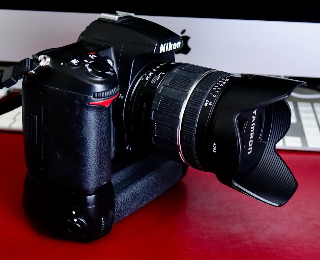 Nikon D7000 met Tamron 28-200mm en Batterijgrip zeer goed, Ophalen of Verzenden, Grip, Nikon