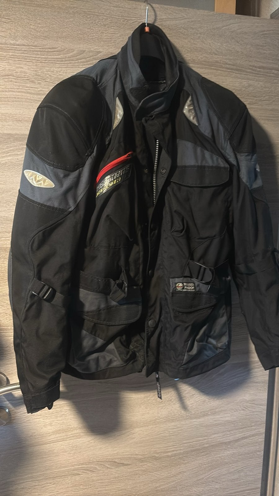 Veste  homme, Ophalen