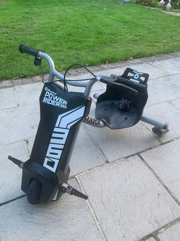 powerrider elektrische drift trike , type 360 merk Razor, Comme neuf