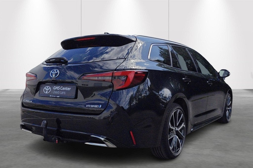 Toyota Corolla TS 1.8 Hybrid Premium e-CVT incl Winterset +, Auto's, Toyota, Gebruikt, 4 cilinders, Automatische klimaatregeling