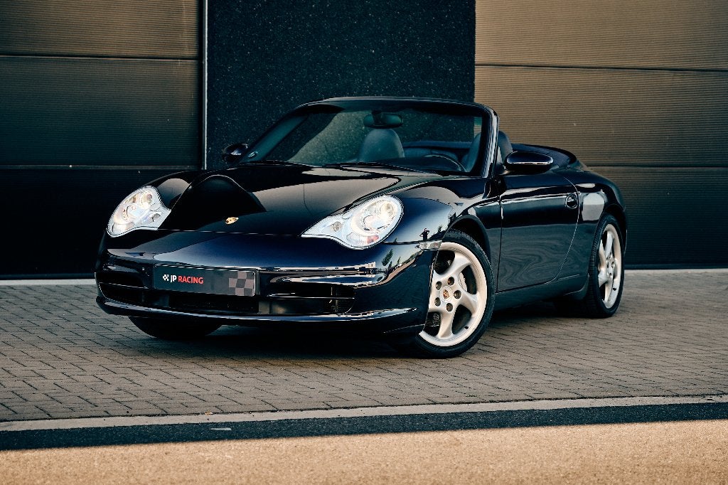 Porsche 996 Carrera 4 cabrio tiptronic 3,6 (320Pk), Auto's, Xenon verlichting, Cabriolet, Blauw, Leder