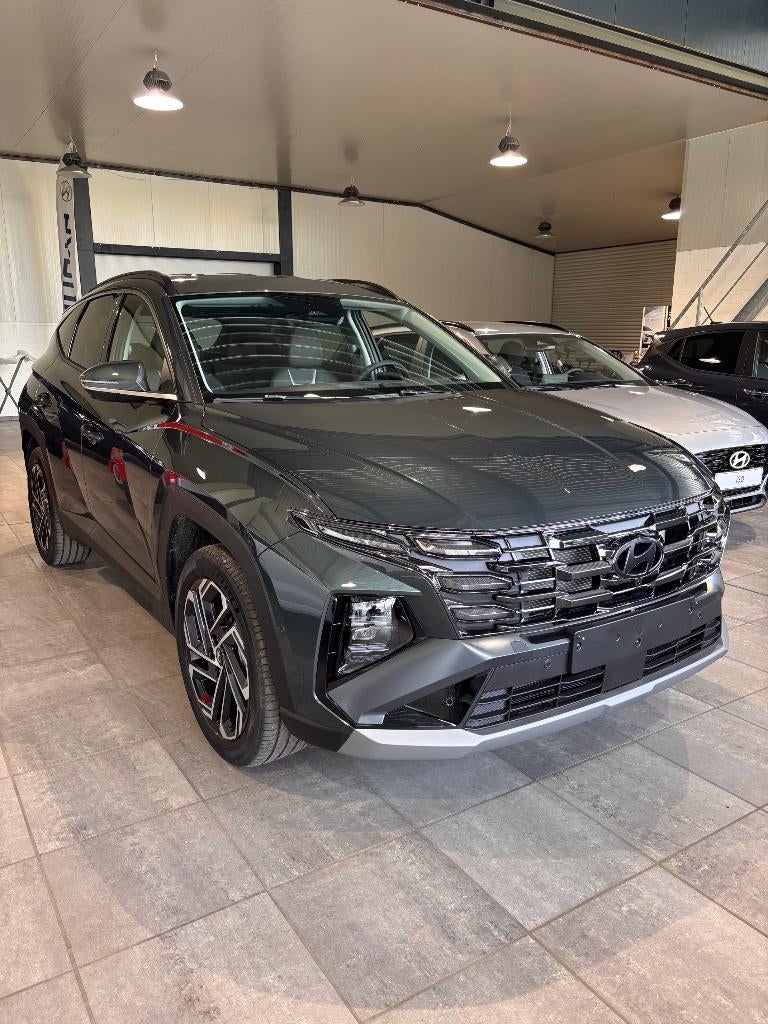 Tucson hybride full option, demowagen! Nu beschikbaar!, Auto's, 4 cilinders, 175 kW, Leder, Bedrijf
