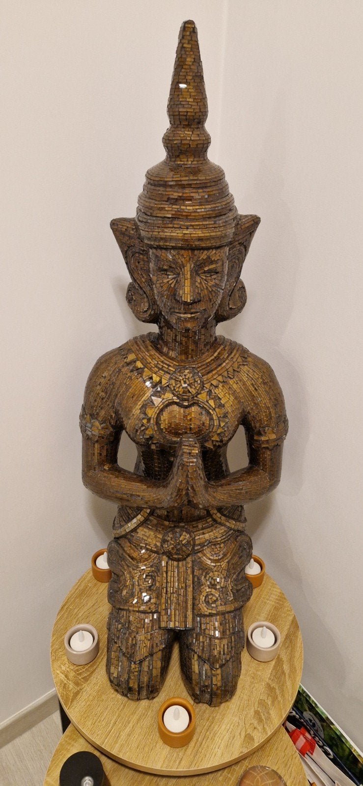 Statue Thaïlandaise, Ophalen