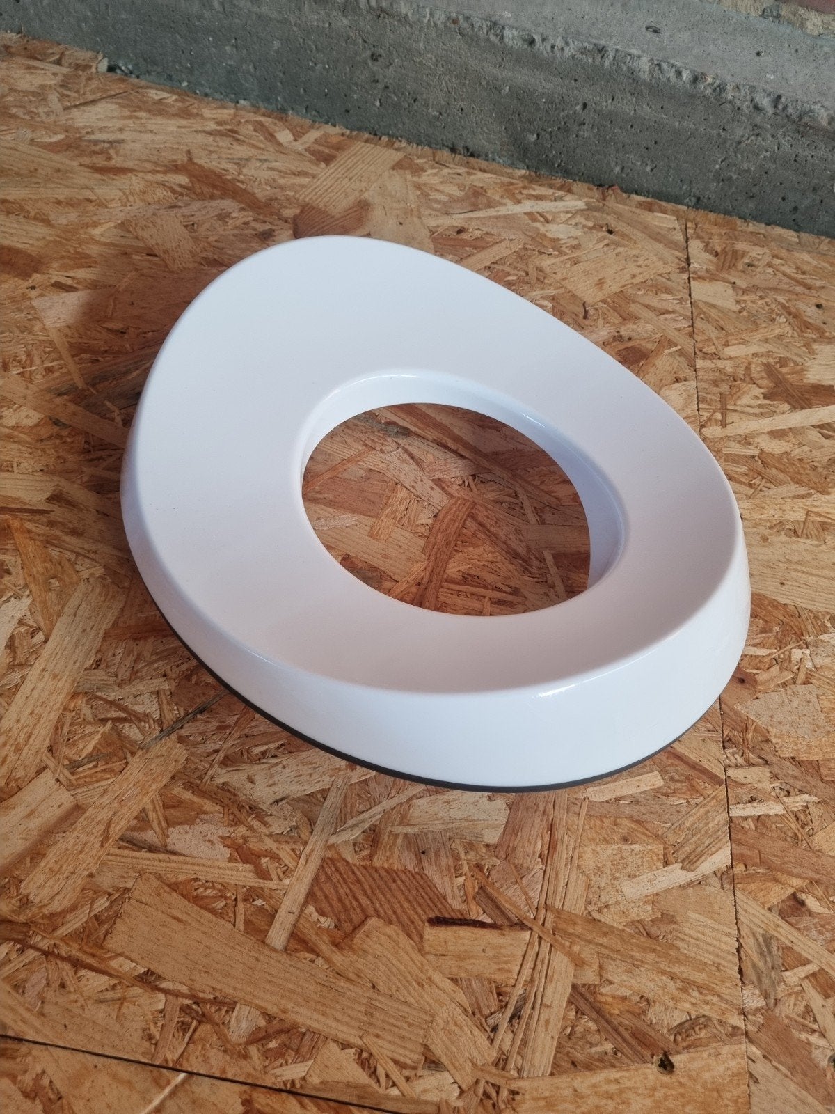 Réducteur de siège de toilette, Enlèvement