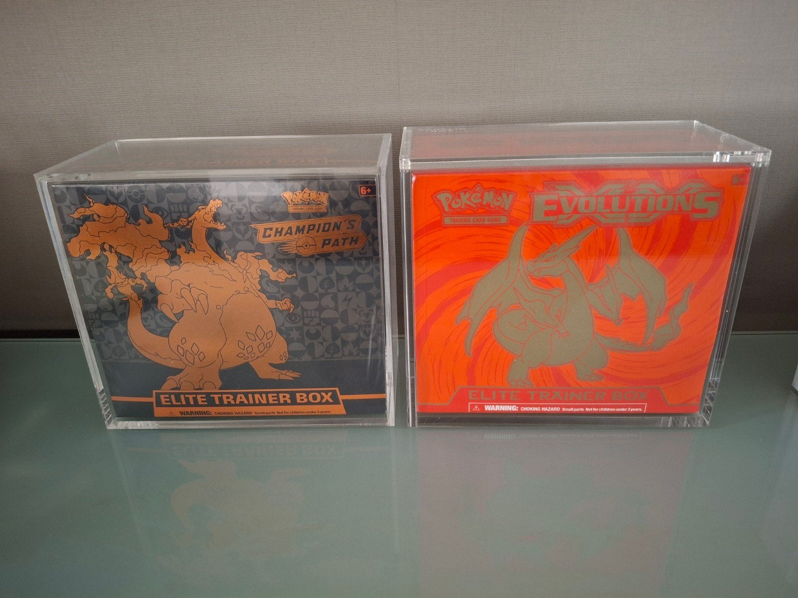 20 jaar pokémon XY Evolutions charizard etb + Champions Path, Cd's en Dvd's, Ophalen of Verzenden