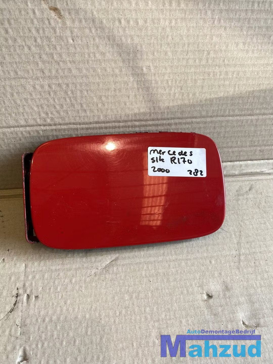 MERCEDES SLK R170 Rood 586 tankklep, Auto-onderdelen, Gebruikt, Mercedes-Benz AG, Mercedes-Benz, Mercedesstrasse 120
70372  Stuttgart, DE
