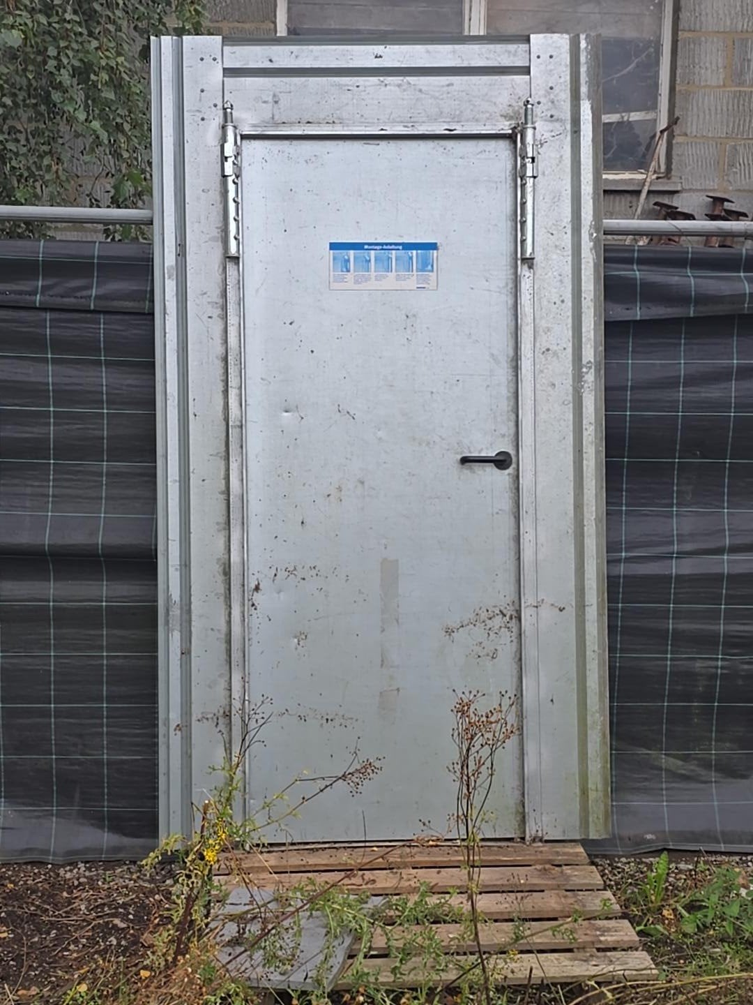 Stalen werfdeur / tijdelijke bouwdeur te koop, Ophalen of Verzenden