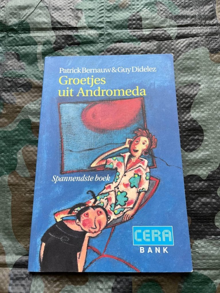 Groetjes uit Andromeda Boek Patrick Bernauw & Guy Didelez, Boeken, Verzenden, Zo goed als nieuw