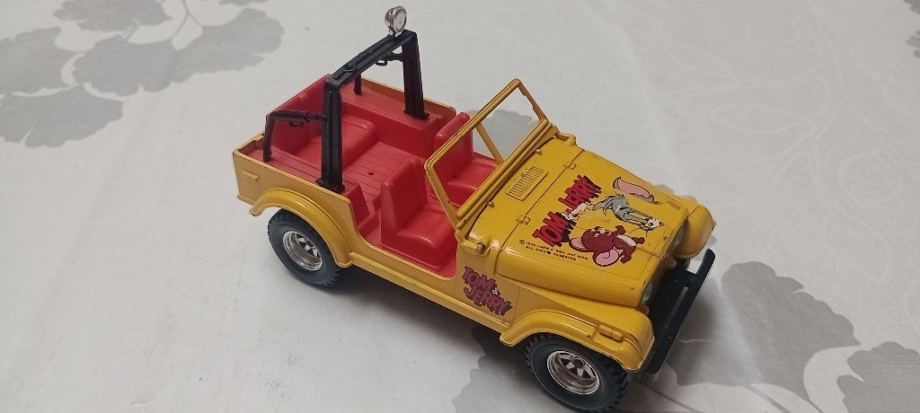 Jeep CJ-7 Bburago 1-24 Tom & Jerry Vintage, Enlèvement ou Envoi, Utilisé, Voiture, Burago