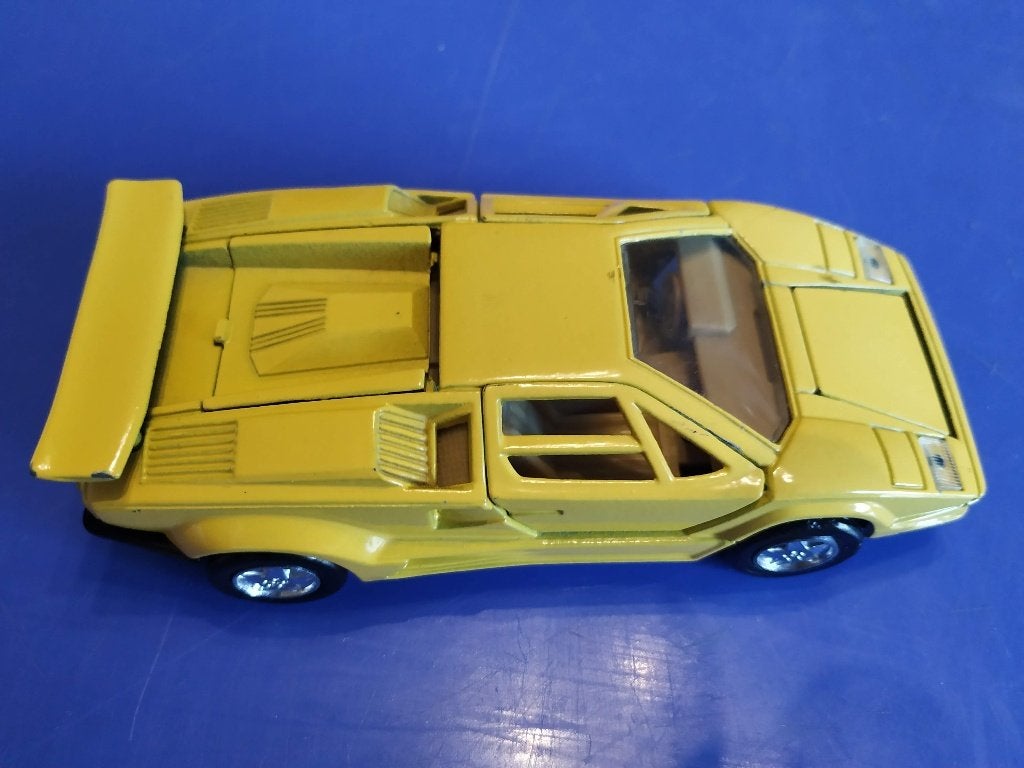 Lamborghini Countach 1988, schaal 1/18 rijdt met opwindveer, Enlèvement ou Envoi