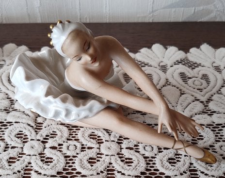 Porseleinen ballerina, Ophalen