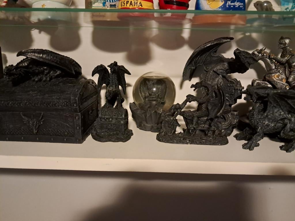 6 draken beelden, Ophalen