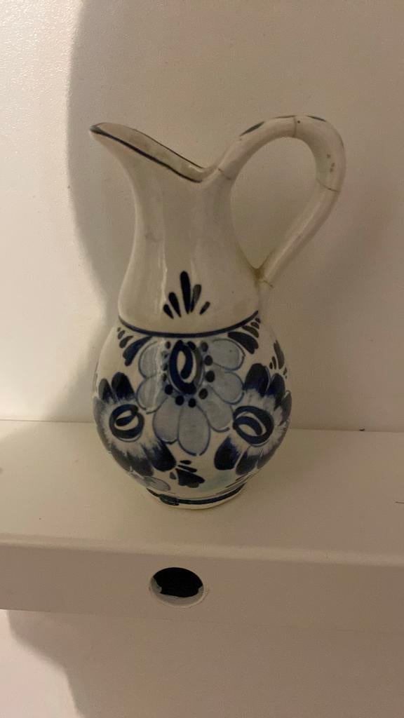 Vase ancien bleu de Delft, Enlèvement