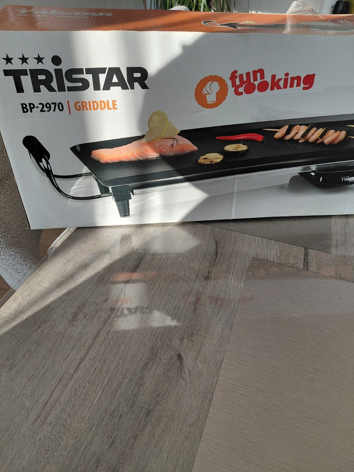 Tristar tafelgril, Ophalen