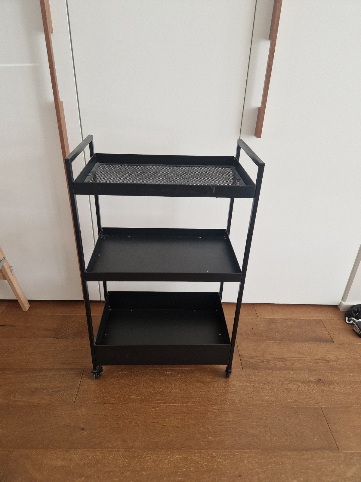 porte-bagages noir sur roulettes, Enlèvement