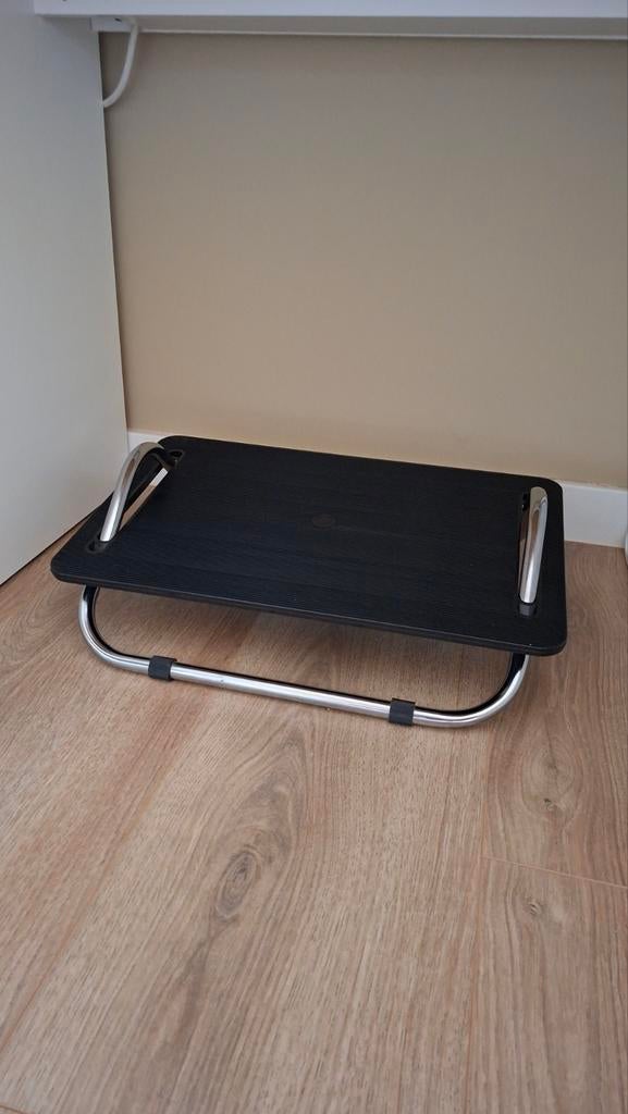 Voetensteun bureau, Ophalen