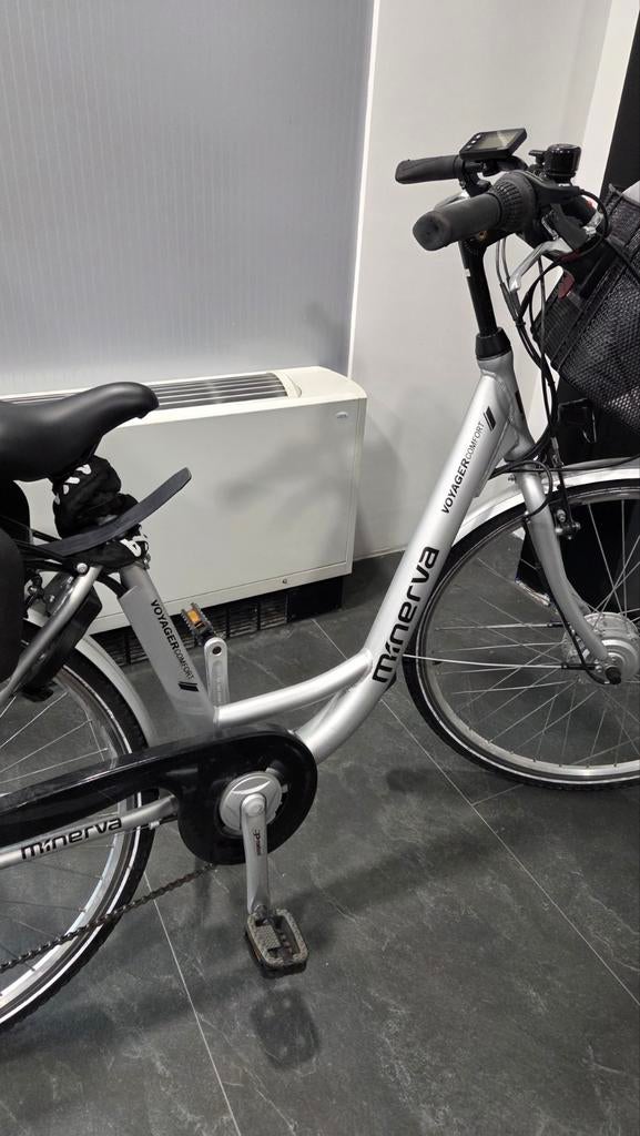 Electrische damesfiets Minerva en kinderstoel Thule, Ophalen