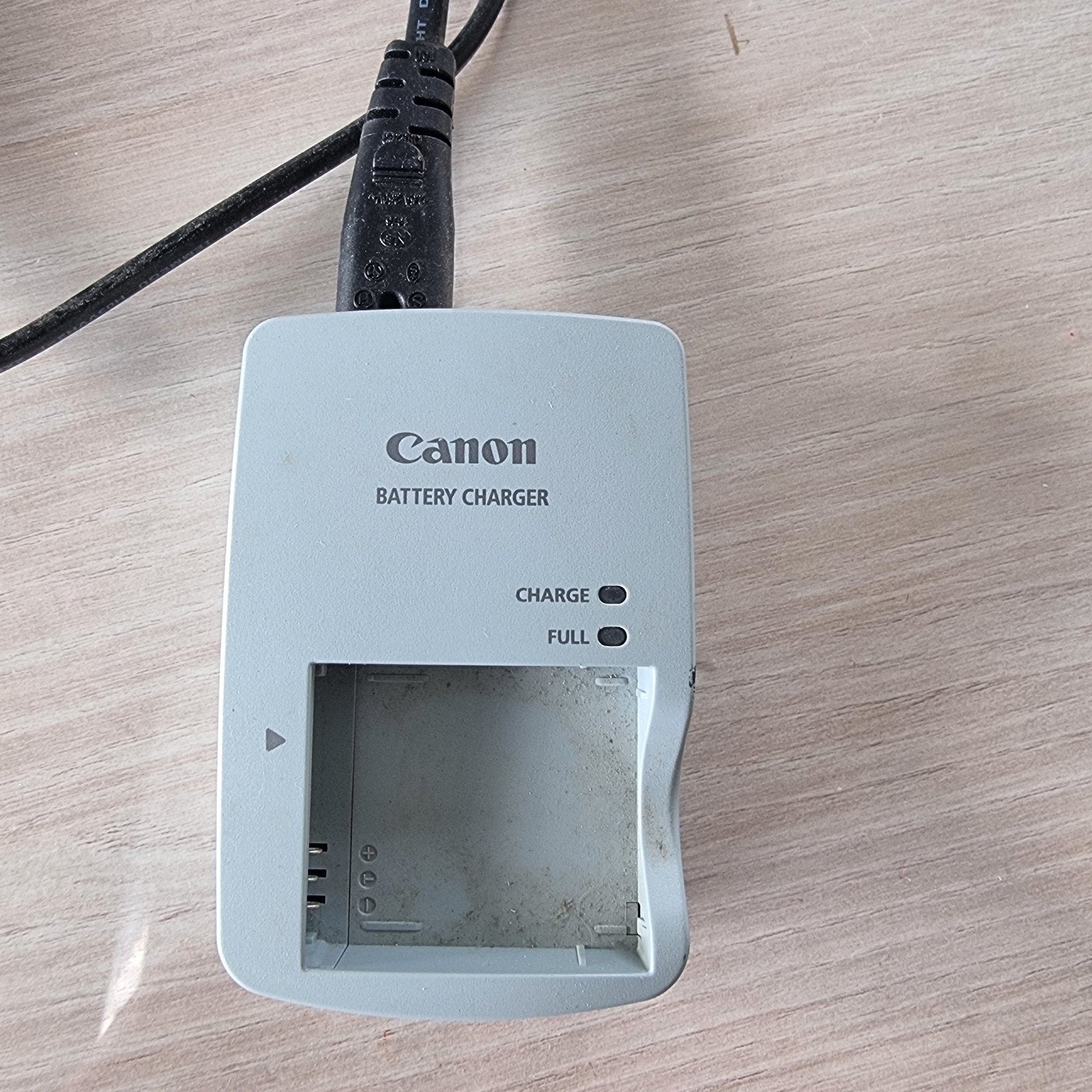 Oplader Canon, Ophalen