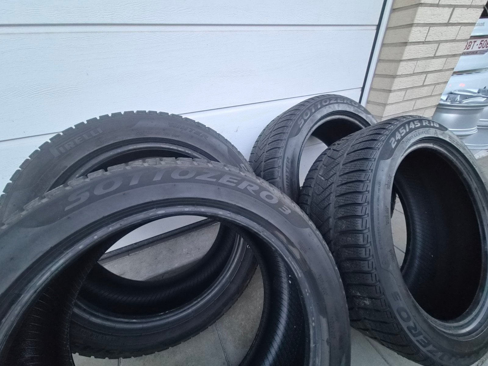 4 PNEUS HIVER PIRELLI SOTTOZERO 3 245/45 R18, Véhicule utilitaire, Enlèvement, Utilisé, Pneus hiver