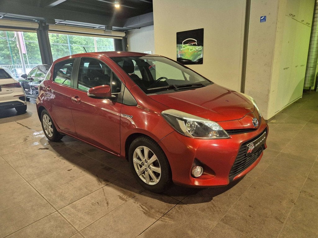 Toyota Yaris 1.0i 16v Linea Luna Freetonic (bj 2014), Auto's, Toyota, Euro 5, Stof, Zwart, Parkeersensor
