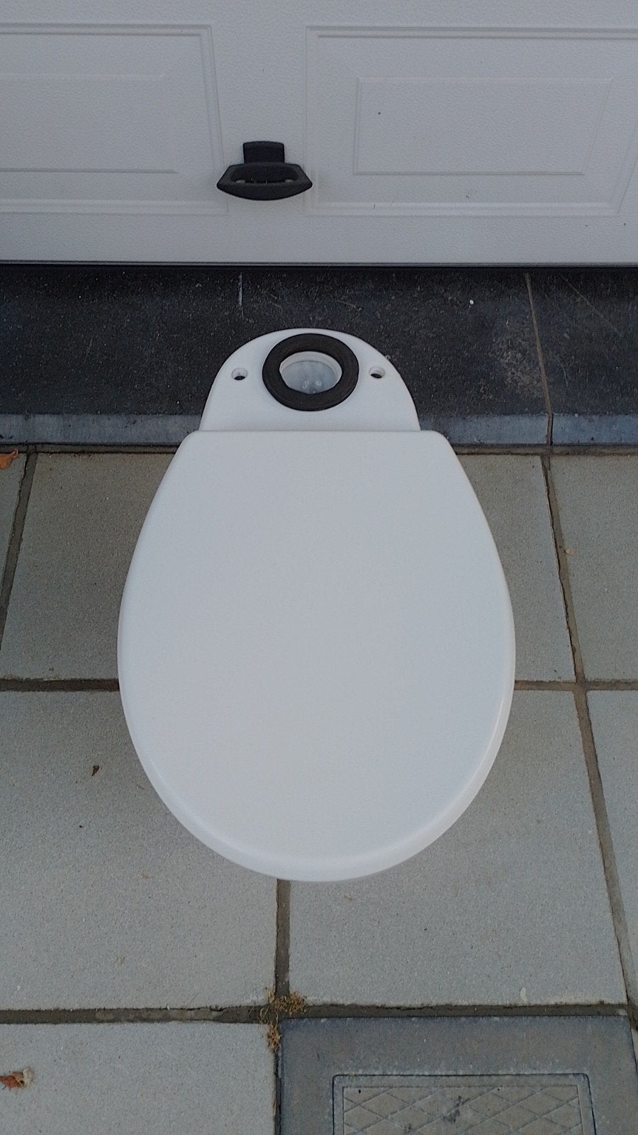 wc verticaal, Ophalen