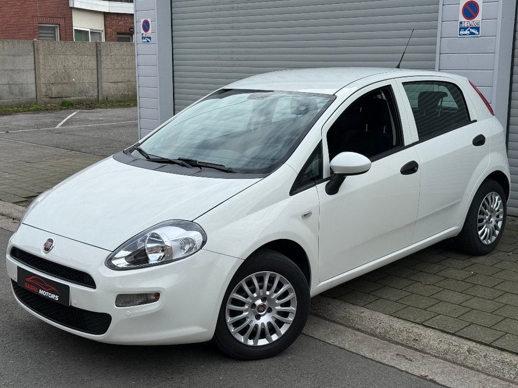Fiat Punto 1.2 Benzine '15 | Airco | 71.000 KM | 12MGarantie, Auto's, Voorwielaandrijving, Dealer onderhouden, Wit, Bedrijf