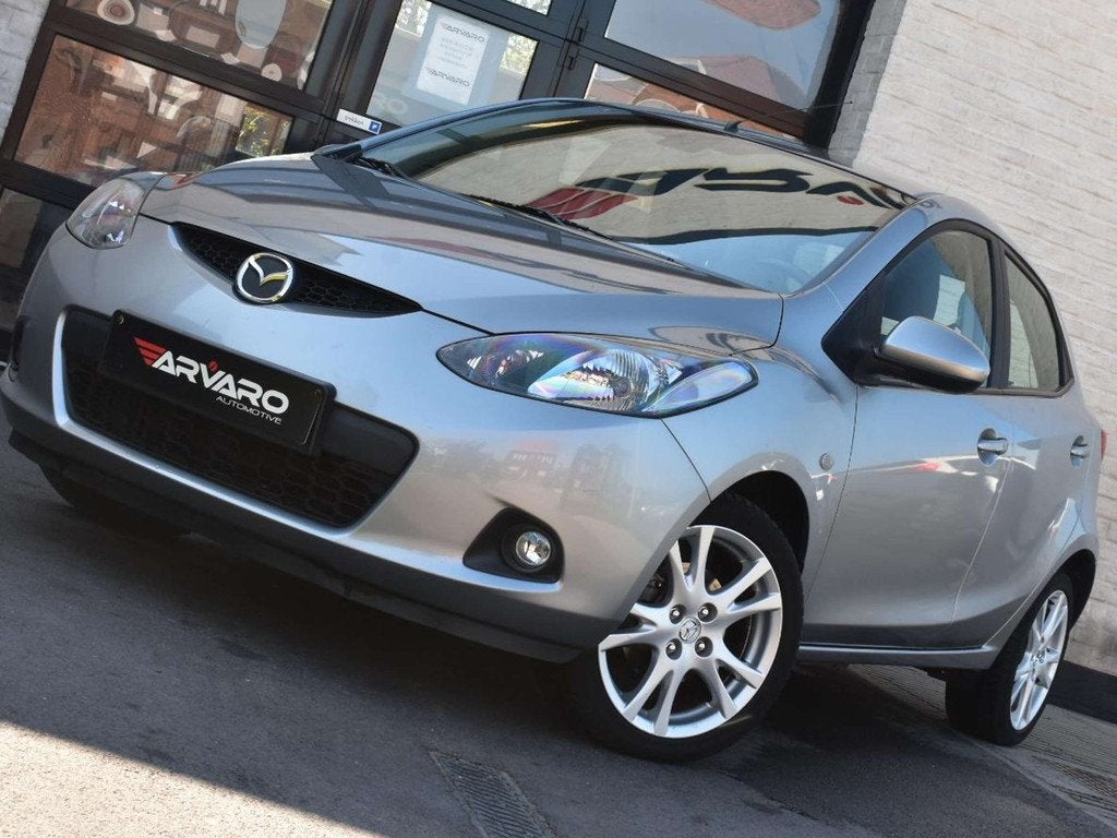 Mazda 2 1.3i Sport / Verw Zetels / PDC / Airco / Garantie, Autos, Mazda, Argent ou Gris, Achat, 63 kW, Entreprise