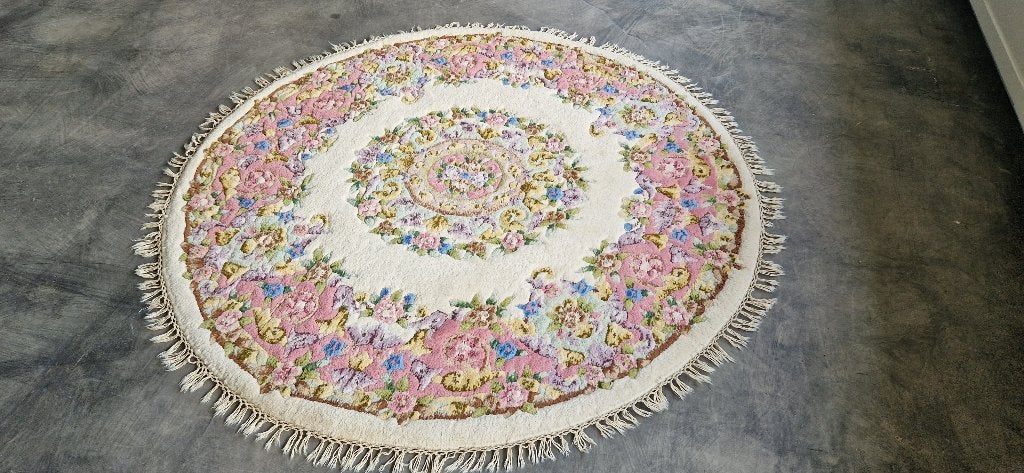Handgeknoopt tapijt Cambodja, Ophalen