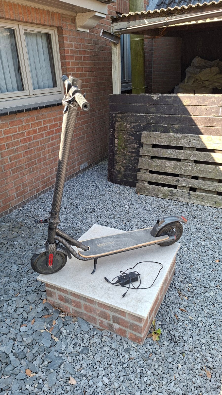 Kapotte electrische step, voor de onderdelen, Ophalen