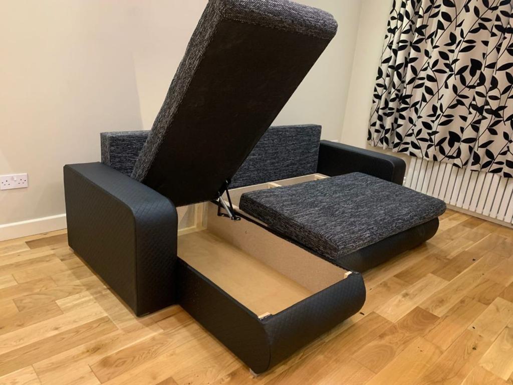 Canapé d'angle en velours noir avec fonction couchage et ran, Maison & Meubles, 100 à 125 cm, Enlèvement ou Envoi, 200 à 250 cm