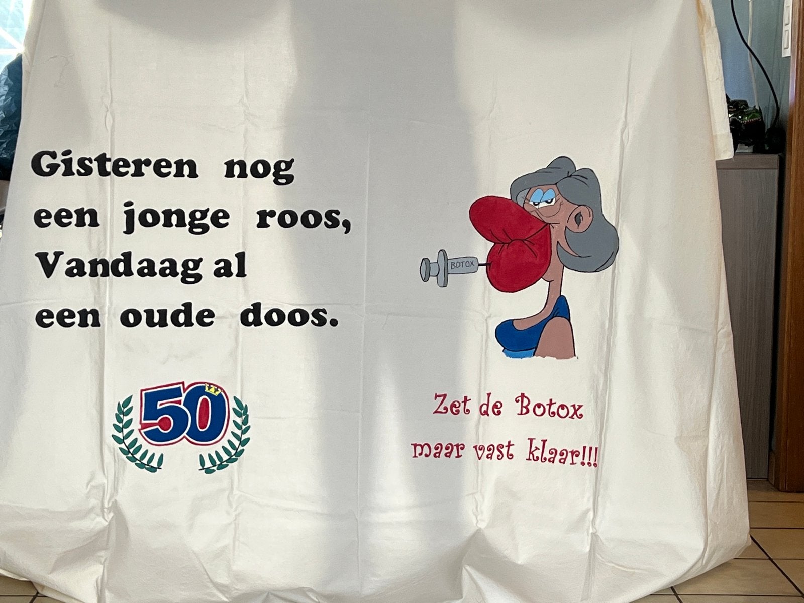 Zelf gemaakte pensioen spandoek, Ophalen