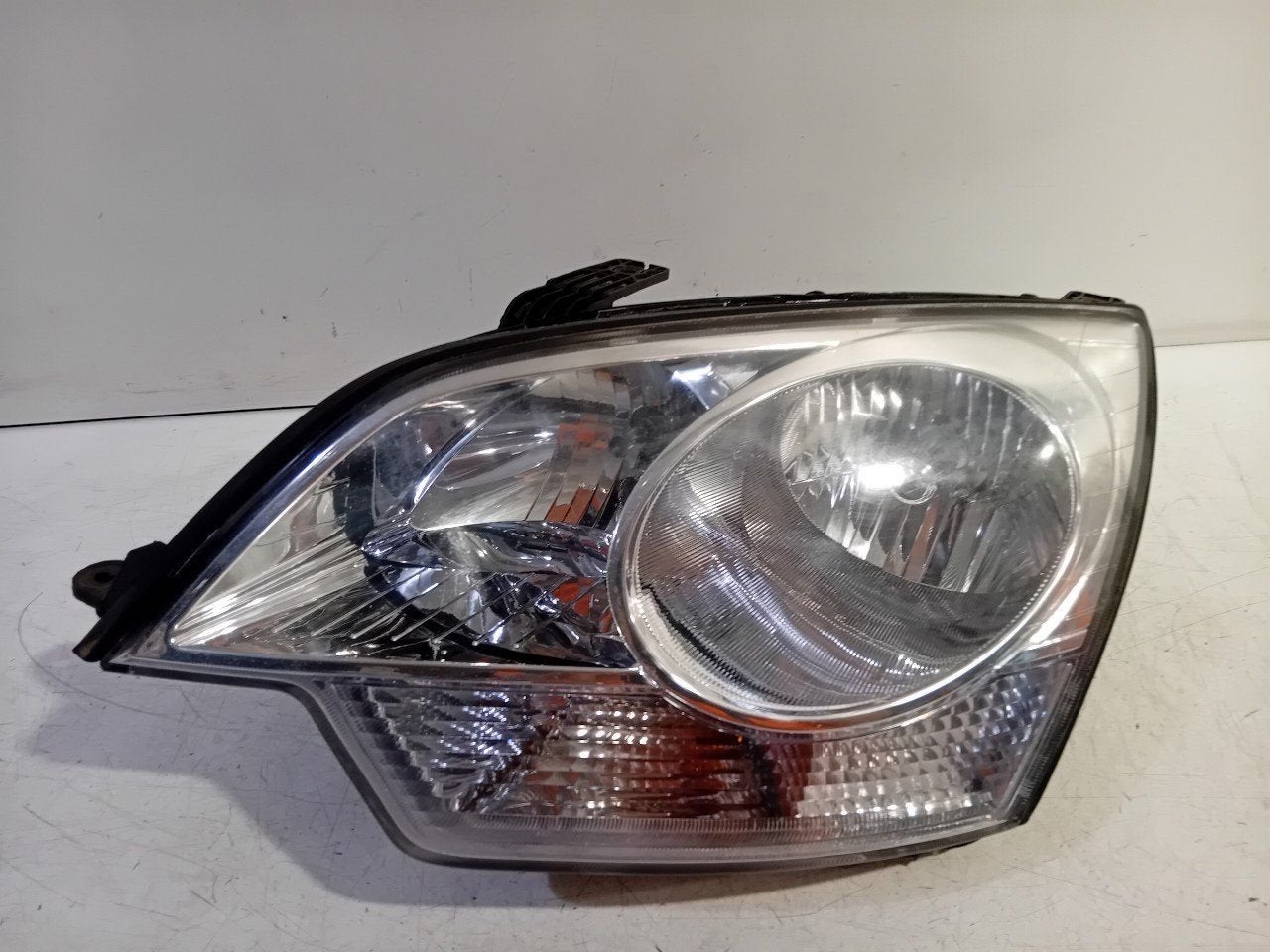 Koplamp links Opel Antara, Auto-onderdelen, Verlichting, Onderdelen@venauto.nl, Van der Ven Autorecycling B.V., Gebruikt, Ettenseweg 76, 4706 PB Roosendaal, The Netherlands