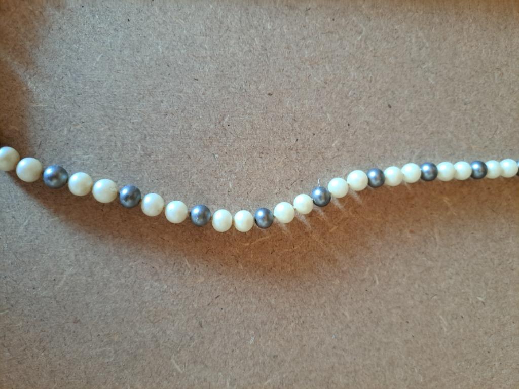 Parelketting, Ophalen, Ketting