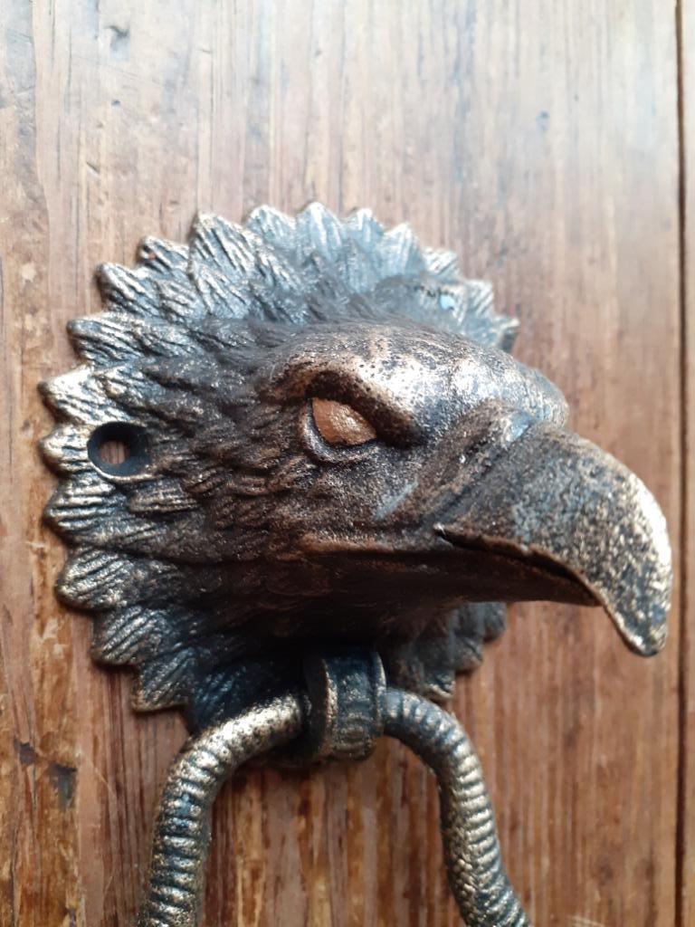 Frappe porte, heurtoir en fonte patinée (tête d'aigle)., Enlèvement ou Envoi, Neuf, Brocante