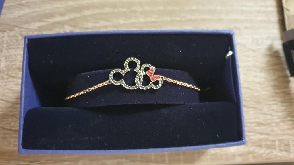 Bracelet Swarovski Mickey et Minnie plaqué or rose neuf, Ophalen of Verzenden, Nieuw, Goud, Goud